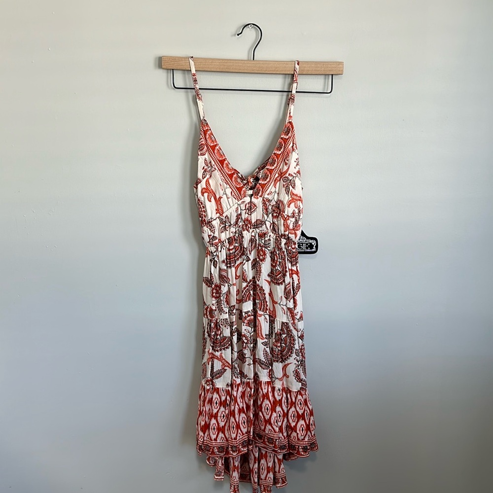 Floral dress new with tags on it.